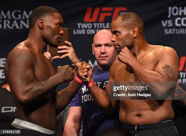 Opponents Anthony 'Rumble' Johnson and Daniel Cormier face off during the UFC 187 weigh-in at the MGM Grand Conference Center on May 22, 2015 in Las...