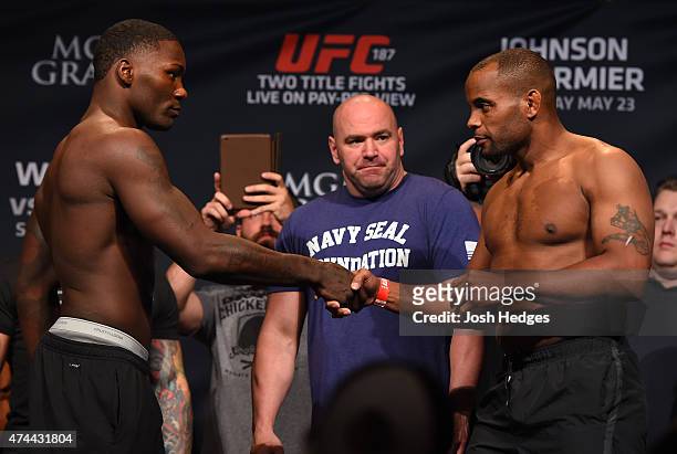 Opponents Anthony 'Rumble' Johnson and Daniel Cormier shake hands during the UFC 187 weigh-in at the MGM Grand Conference Center on May 22, 2015 in...