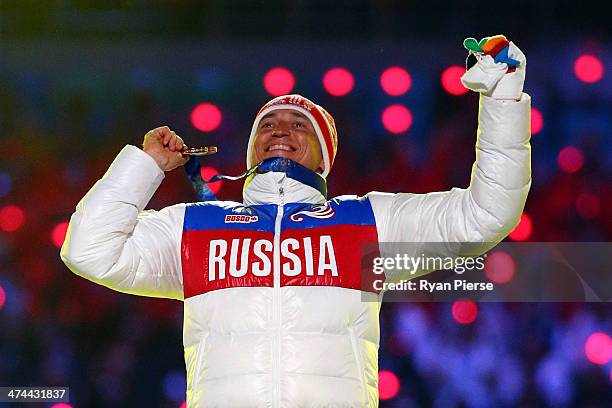 Gold medalist Alexander Legkov of Russia celebrates in the medal ceremony for the Men's 50 km Mass Start Free during the 2014 Sochi Winter Olympics...