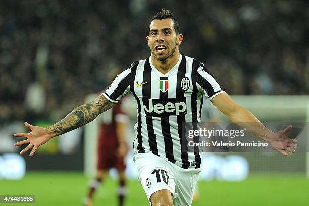 Carlos Tevez of Juventus celebrates after scoring the opening goal during the Serie A match between Juventus and Torino FC at Juventus Arena on...