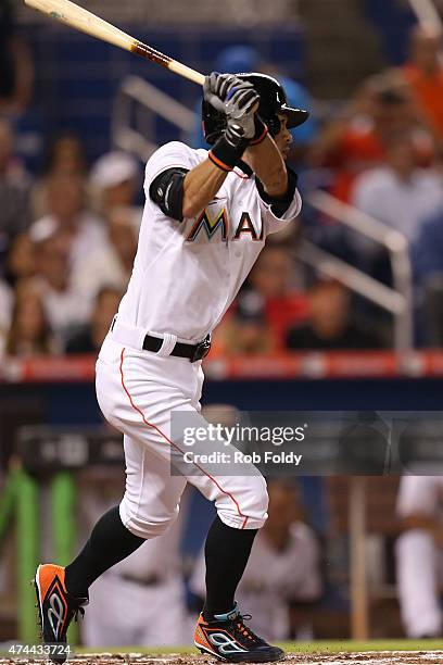 Ichiro Suzuki of the Miami Marlins gets a hit during the second inning of the game against the Baltimore Orioles at Marlins Park on May 22, 2015 in...