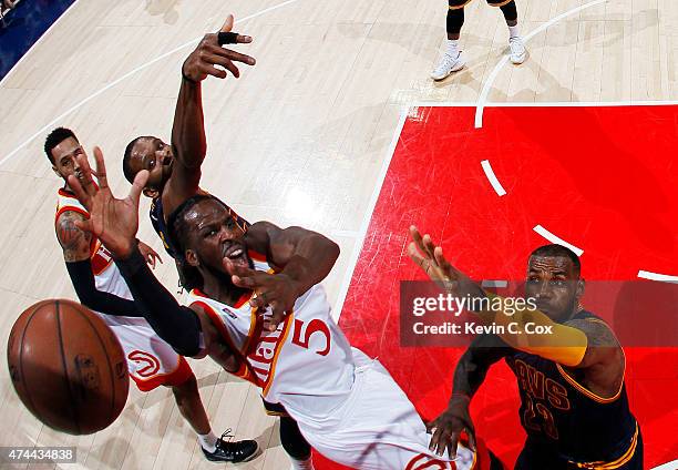 DeMarre Carroll of the Atlanta Hawks goes up against LeBron James of the Cleveland Cavaliers in the second quarter during Game Two of the Eastern...