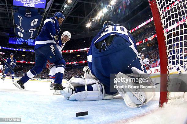 Chris Kreider of the New York Rangers scores a goal against Ben Bishop of the Tampa Bay Lightning during the second period in Game Four of the...