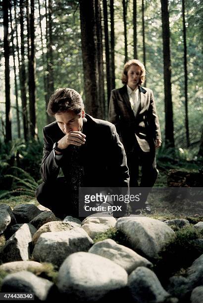 Agent Fox Mulder and Agent Dana Scully in the "Conduit" episode of THE X-FILES which originally aired on October 1, 1993.