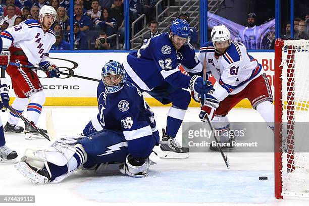 Rick Nash of the New York Rangers scores a goal against Ben Bishop of the Tampa Bay Lightning during the third period in Game Four of the Eastern...