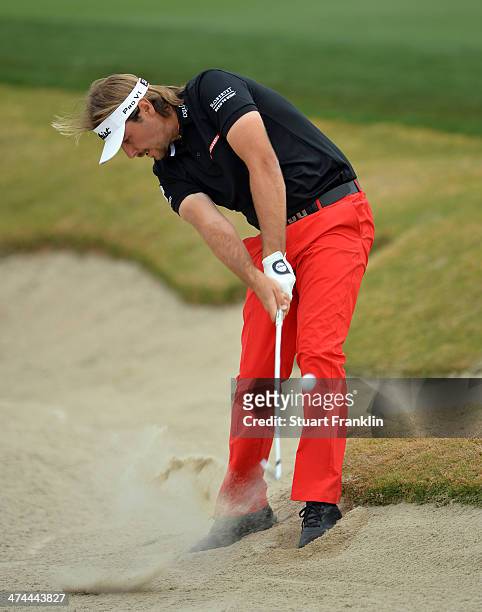 Victor Dubuisson of France plays a shot on the 17th hole during the semifinal round of the World Golf Championships - Accenture Match Play...