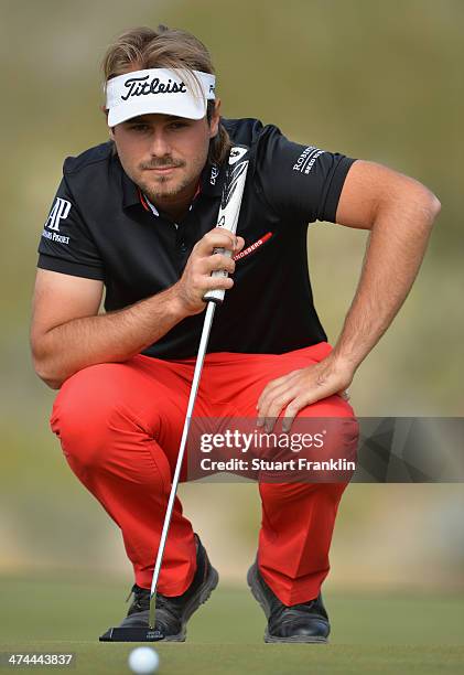 Victor Dubuisson of France lines up a putt on the 12th hole during the semifinal round of the World Golf Championships - Accenture Match Play...