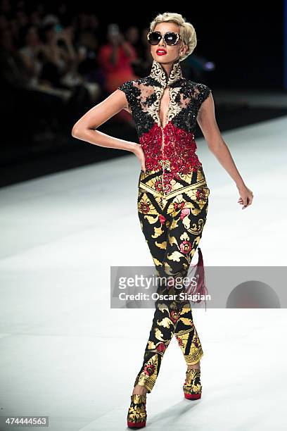 Model showcases designs by Anne Avantie on the runway during Indonesia Fashion Week 2014 day 4 at Jakarta Convention Center on February 23, 2014 in...
