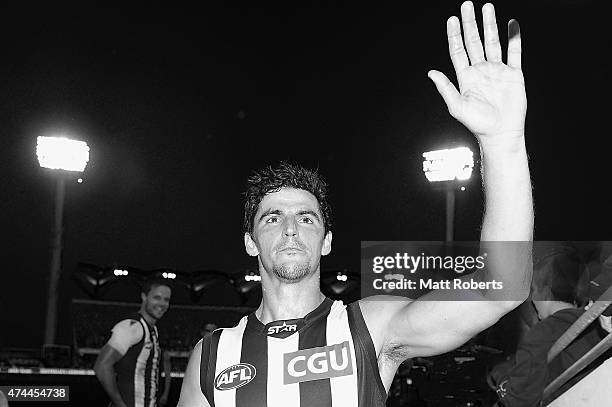 Scott Pendlebury of the Magpies acknowledges the crowd after the round eight AFL match between the Gold Coast Suns and the Collingwood Magpies at...