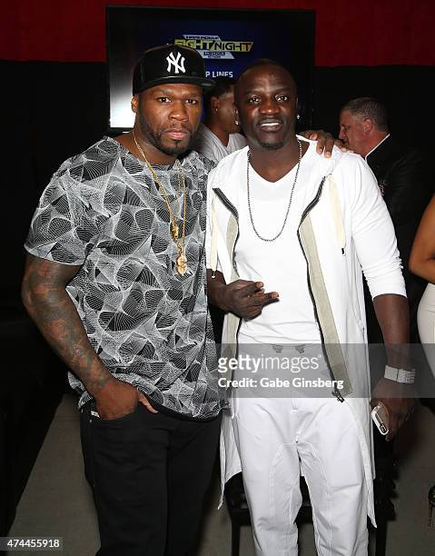 Rapper Curtis "50 Cent" Jackson and recording artist Akon attend the "Knockout Night at the D" boxing event at the Downtown Las Vegas Events Center...