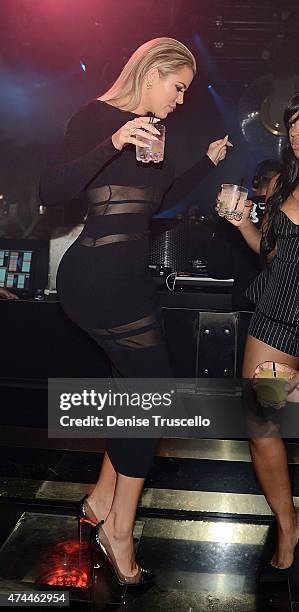 Khloe Kardashian, Kadisha Haqq and Dorion Renaud attend 1 OAK Nightclub Las Vegas at the Mirage Hotel & Casino on May 22, 2015 in Las Vegas, Nevada.