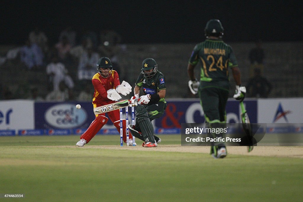 Pakistani and Zimbabwe cricket players take a part of the...