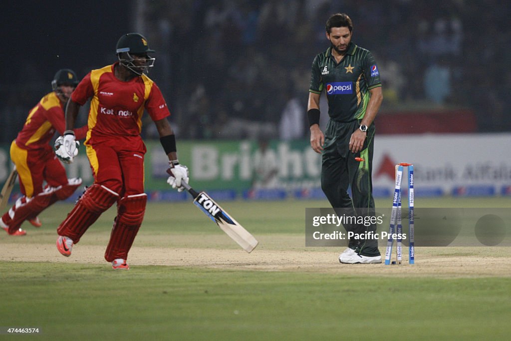 Pakistani and Zimbabwe cricket players take a part of the...