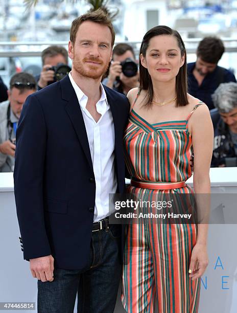 Marion Cotillard and Michael Fassbender attend the "Macbeth" photocall during the 68th annual Cannes Film Festival on May 23, 2015 in Cannes, France.