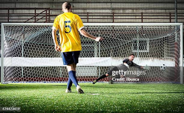 football match in stadium: penalty kick - shooting at goal 個照片及圖片檔