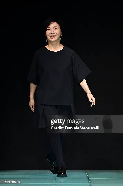 Designer Izumi Ogino aknowledge the applause of the audience after the Anteprima show as part of Milan Fashion Week Womenswear Autumn/Winter 2014 on...