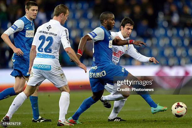 Robert Demjan of Waasland Beveren and Siebe Blondelle of Waasland Beveren battle for the ball with Khaleem Hyland of KRC Genk and Jeroen Simaeys of...