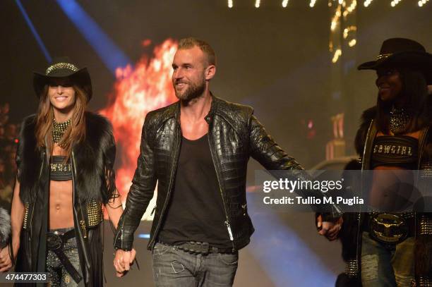 Model, Philipp Plein and Naomi Campbell walk the runway during the Philipp Plein show as part of Milan Fashion Week Womenswear Autumn/Winter 2014 on...