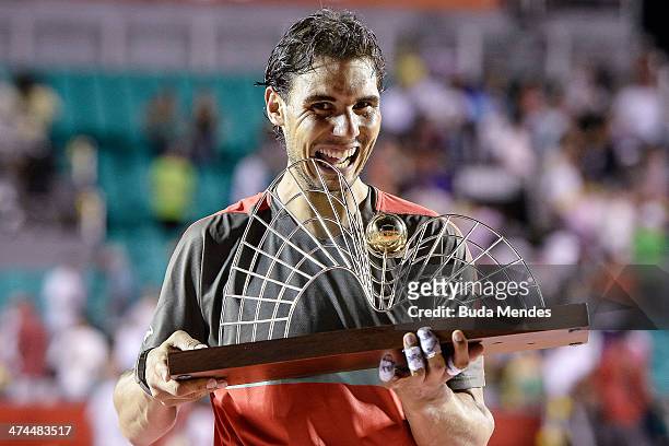 Rafael Nadal of Spain poses with his trophy after defeating Alexandr Dolgopolov of Ukraine during the ATP Rio Open 2014 at Jockey Club Rio de Janeiro...