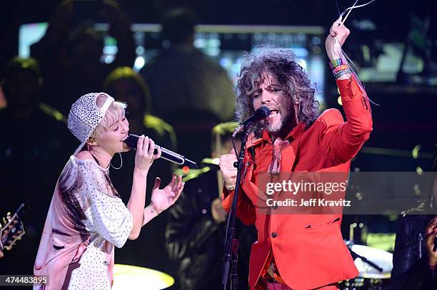 Miley Cyrus and Wayne Coyne perform at Staples Center on February 22, 2014 in Los Angeles, California.