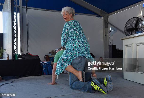 Chefs Robert Irvine and Paula Deen attend KitchenAid® Culinary Demonstrations during the Food Network South Beach Wine & Food Festival at Grand...