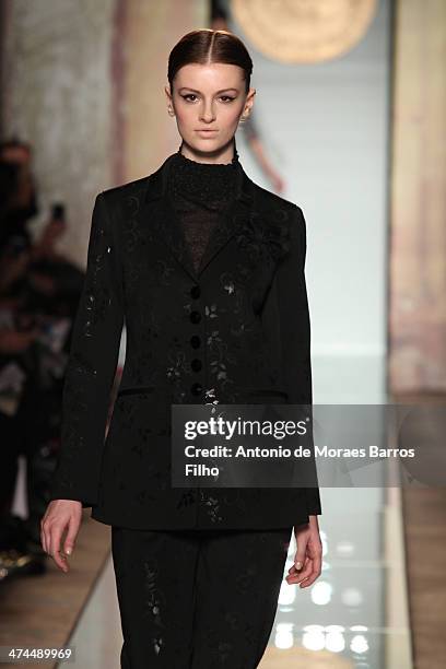 Model walks the runway during the Roccobarocco show as a part of Milan Fashion Week Womenswear Autumn/Winter 2014 on February 23, 2014 in Milan,...