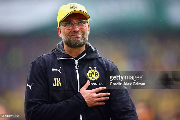 Head coach Juergen Klopp of Dortmund says farewell to the fans after the Bundesliga match between Borussia Dortmund and Werder Bremen at Signal Iduna...