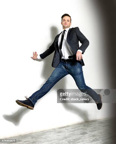 business man jumping - necktie run stockfoto's en -beelden