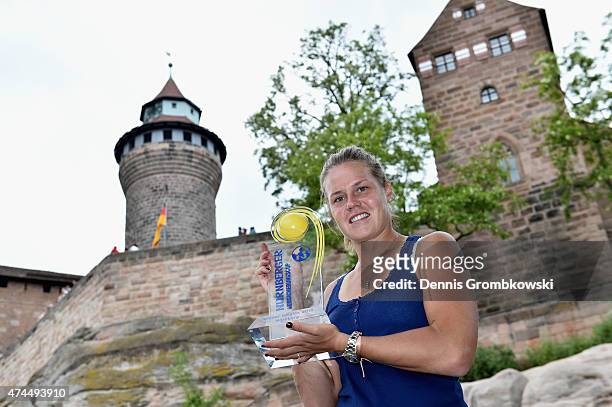 Karin Knapp of Italy poses in front of Nuremberg Castle after her victory in the Nuernberger Versicherungscup 2015 on May 23, 2015 in Nuremberg,...