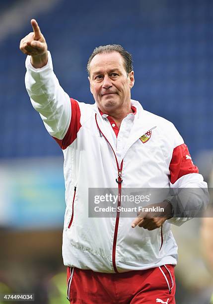 Huub Stevens, head coach of Stuttgart celebrates staying in the first Bundesliga after winning the Bundesliga match between SC Paderborn 07 and VfB...