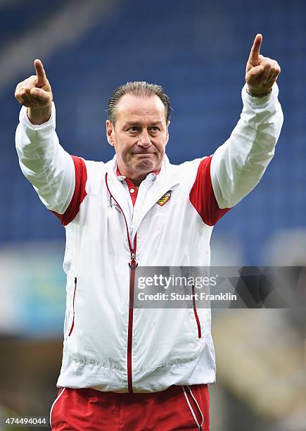 Huub Stevens, head coach of Stuttgart celebrates staying in the first Bundesliga after winning the Bundesliga match between SC Paderborn 07 and VfB...