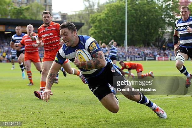 Matt Banahan of Bath dives over to score the opening try of the game during the Aviva Premiership Semi Final match between Bath Rugby and Leicester...