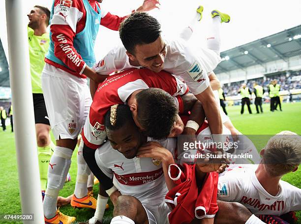 The players of Stuttgart celebrate staying in the first Bundesliga after winning the Bundesliga match between SC Paderborn 07 and VfB Stuttgart at...