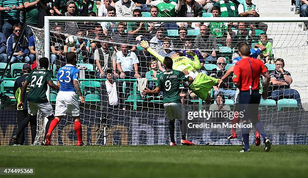 Jason Cummings shot beats Rangers goalkeeper Cammy Bell during the Scottish Championship play off semi final, second leg match between Hibernian and...