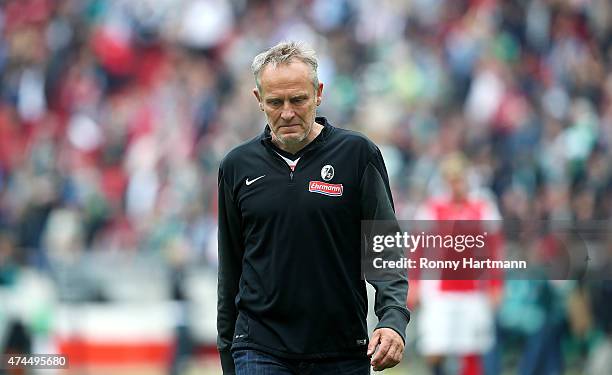 Head coach Christian Streich of Freiburg leaves the pitch after the Bundesliga match between Hannover 96 and SC Freiburg at HDI-Arena on May 23, 2015...