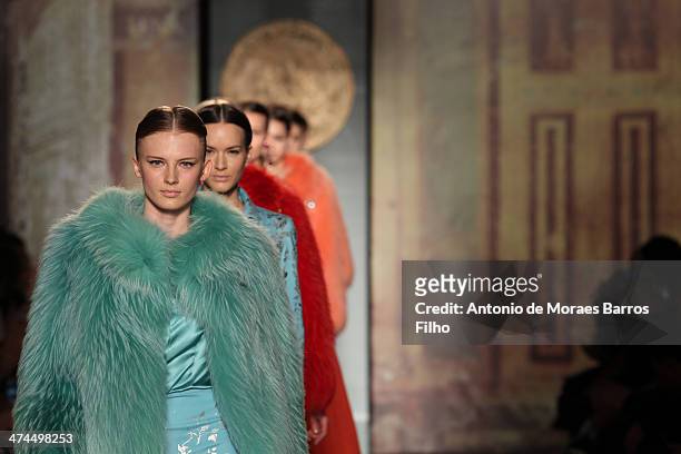 Models walk the runway during the Roccobarocco show as a part of Milan Fashion Week Womenswear Autumn/Winter 2014 on February 23, 2014 in Milan,...