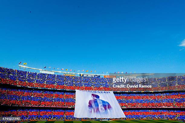 Barcelona fans display a huge banner tribute to Xavi Hernanez prior to the La Liga match between FC Barcelona and RC Deportivo de la Coruna at Camp...