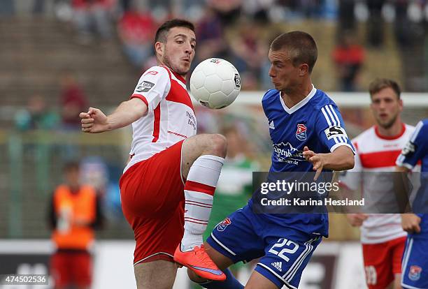 Kevin Moehwald of Erfurt challenges Tobias Killer of Unterhaching during the Third League match between FC Rot Weiss Erfurt and SpVgg Unterhaching at...