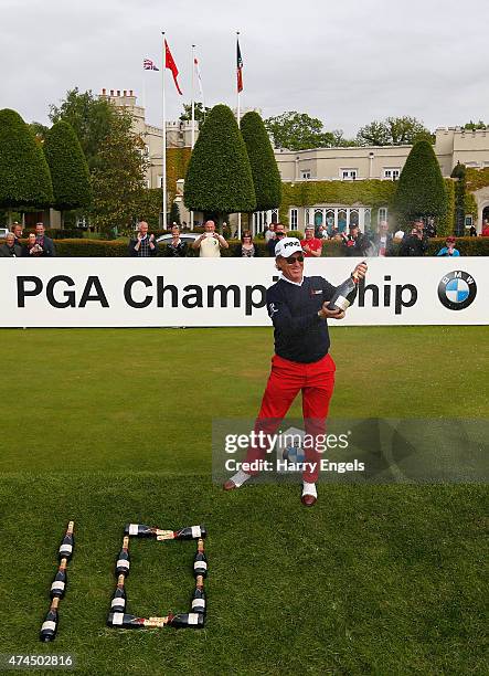 Miguel Angel Jimenez of Spain celebrates after his record tenth hole-in-one on the European Tour during day 3 of the BMW PGA Championship at...