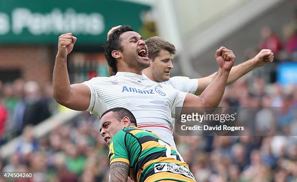 Billy Vunipola of Saracens celebrates their victory during the Aviva Premiership play off semi final match between Northampton Saints and Saracens at...