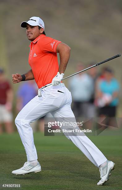 Jason Day of Australia runs on the first playoff hole semifinal match during the semifinal round of the World Golf Championships - Accenture Match...