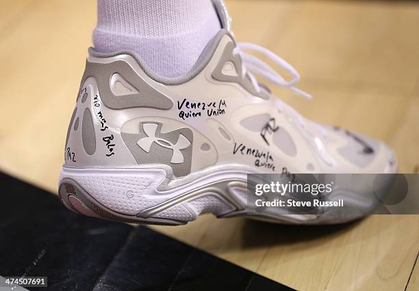 Toronto Raptors point guard Greivis Vasquez's shoes read "No ma balas" and "Venezuela quiere union" and "Venezuela quiere paz" as his country has...