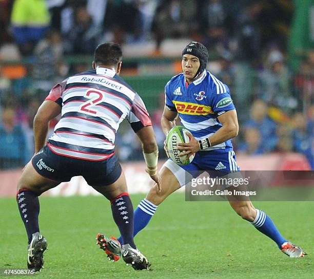 Cheslin Kolbe of the Stormers and Pat Leafa of the Rebels in action during the Super Rugby match between DHL Stormers and Melbourne Rebels at DHL...