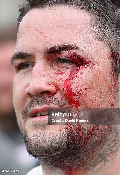 Blood streams down the face of Brad Barritt, the Saracens centre during the Aviva Premiership play off semi final match between Northampton Saints...