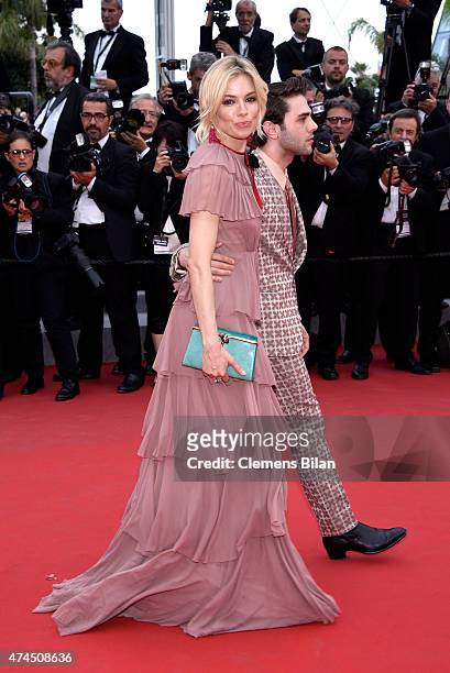 Actress Sienna Miller and Director Xavier Dolan attend the Premiere of "Macbeth" during the 68th annual Cannes Film Festival on May 23, 2015 in...