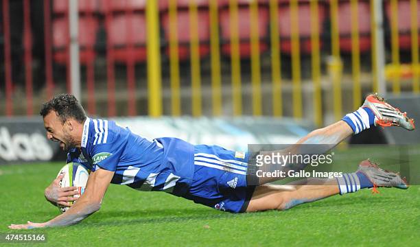 Dillyn Leyds of the Stormers dives over for a try during the Super Rugby match between DHL Stormers and Melbourne Rebels at DHL Newlands Stadium on...