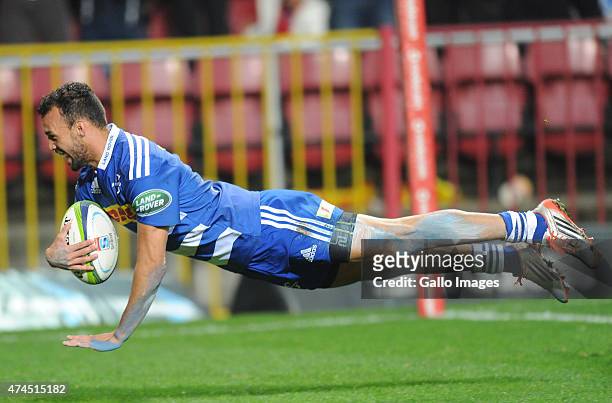 Dillyn Leyds of the Stormers dives over for a try during the Super Rugby match between DHL Stormers and Melbourne Rebels at DHL Newlands Stadium on...