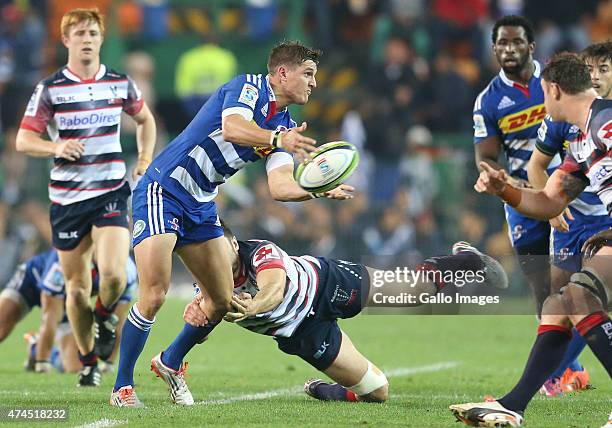 Louis Schreuder of the Stormers is tackled during the Super Rugby match between DHL Stormers and Melbourne Rebels at DHL Newlands Stadium on May 23,...