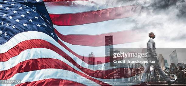 successful business man looking away against the skyline - hanging flag stock pictures, royalty-free photos & images
