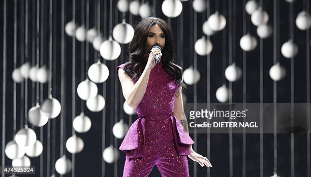 Eurovision Song Contest winner, Conchita Wurst from Austria performs during the Eurovision Song Contest final on May 23, 2015 in Vienna. AFP PHOTO /...